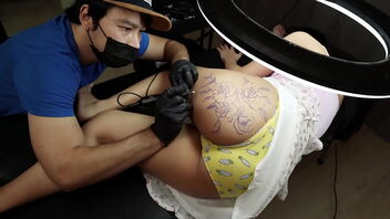 Steamy scene of a tattooed girl with a nice ass getting a rough fuck from the tat artist.