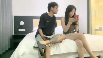 A young Asian girl gives a blowjob to Superman Tanhua.