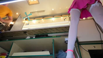 Beautiful 18-year-old woman at work, hidden camera captures her upskirt shots.