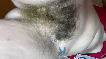 Close up of a hairy pussy pubic hair in a solo homemade video