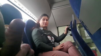 Beautiful woman with perfect globes shows herself off and gets a handjob on the bus