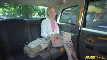 A blonde gets a raunchy and fast fuck in a fake taxi.