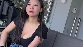 Caught in the act: Big boobies Asian chick in public