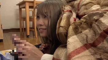 Pretty Asian wife gets teased in a naughty way in front of the kotatsu.