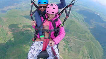 Handsome woman has perfect body and enjoys rough hookup and squirting during paragliding.