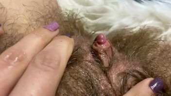 Close up of a big orgasm from a huge clitoris erection in an amateur video.