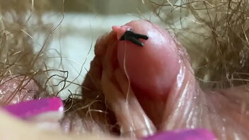 Close up and intimate with a big clit, hairy body, and more in this fetish video.