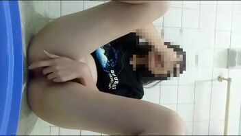 Beautiful Vietnamese girls pleasure themselves in the bathroom