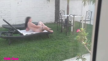 Naked sunbathing stepsister in the garden, spraying orgasm