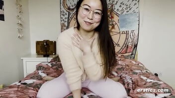 First time: Pretty Chinese girl is very happy to make a masturbation flick for us.