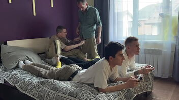 Stepfather and stepson having joy with twinks while playing video games and engaging in anal hook-up