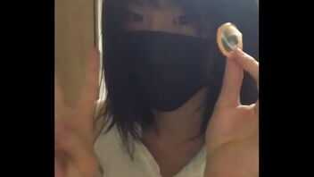 Gay Japanese man masturbates with condoms